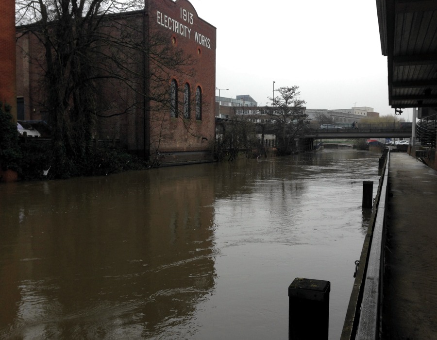 Guildford flooding Boxing day 2013 - River Way passing electric building